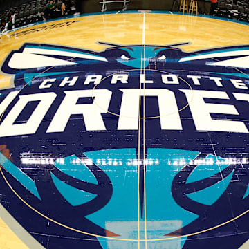 Oct 11, 2017; Charlotte, NC, USA; A view of the Charlotte Hornets logo at half court prior to the game against the Boston Celtics at Spectrum Center. Mandatory Credit: Jeremy Brevard-Imagn Images