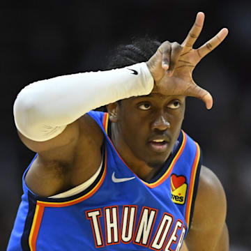 Oct 27, 2023; Cleveland, Ohio, USA; Oklahoma City Thunder forward Jalen Williams (8) celebrates a three point basket in the third quarter against the Cleveland Cavaliers at Rocket Mortgage FieldHouse. Mandatory Credit: David Richard-Imagn Images