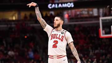 Feb 28, 2025; Chicago, Illinois, USA; Chicago Bulls forward Lonzo Ball (2) hits a three point shot against Toronto Raptors
