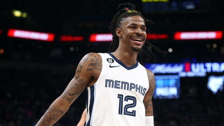 Apr 4, 2023; Memphis, Tennessee, USA; Memphis Grizzlies guard Ja Morant (12) reacts during the second half against the Portland Trail Blazers at FedExForum. 