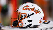 Sep 9, 2023; Tempe, Arizona, USA; Detailed view of an Oklahoma State Cowboys helmet at Mountain America Stadium. Mandatory Credit: Mark J. Rebilas-Imagn Images