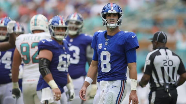 Oct 8, 2023; Miami Gardens, Florida, USA; New York Giants quarterback Daniel Jones (8) looks on against the Miami Dolphins during the third quarter at Hard Rock Stadium.  