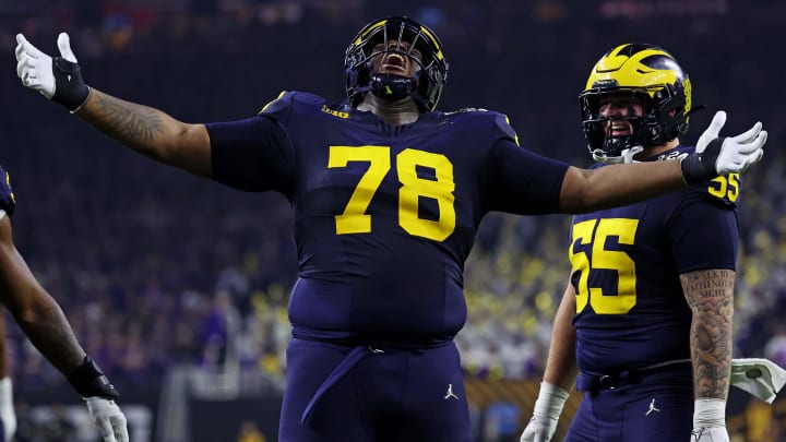 Jan 8, 2024; Houston, TX, USA; Michigan Wolverines defensive lineman Kenneth Grant (78) celebrates after a sack during the second quarter against the Washington Huskies in the 2024 College Football Playoff national championship game at NRG Stadium. Mandatory Credit: Troy Taormina-USA TODAY Sports