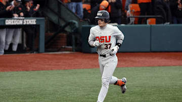 Jun 12, 2022; Corvallis, OR, USA; Oregon State Beavers infielder Travis Bazzana (37) runs the bases after hitting a home run against the Auburn Tigers in the 4th inning during Game 2 of a NCAA Super Regional game at Coleman Field. Mandatory Credit: Soobum Im-Imagn Images