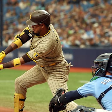 San Diego Padres first base Luis Arraez (4) singles against the Tampa Bay Rays during the third inning at Tropicana Field on Sept. 1.