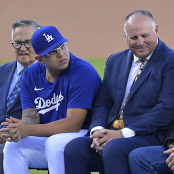 Aug 11, 2023; Los Angeles, California, USA;  Los Angeles Dodgers starting pitcher Julio Urias (7), Mike Scioscia and Sandy Koufax attend the jersey retirement ceremony for Los Angeles Dodgers pitcher Fernando Valenzuela (34) prior to a game against the Colorado Rockies at Dodger Stadium.