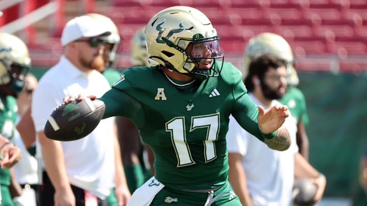 Byrum Brown threw four touchdown passes to lead the Bulls rout of South Carolina State