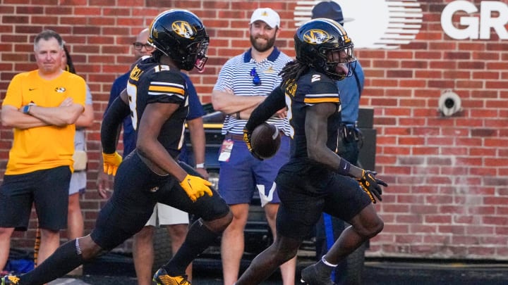 Aug 29, 2024; Columbia, Missouri, USA; Missouri Tigers cornerback Toriano Pride Jr. (2) scores after intercepting a pass against the Murray State Racers during the first half at Faurot Field at Memorial Stadium. Mandatory Credit: Denny Medley-USA TODAY Sports