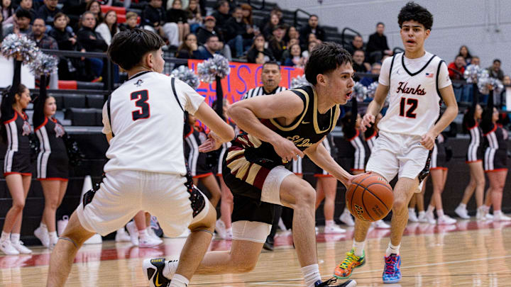El Dorado’s Adrian Rodriguez (3) dribbles the ball during a District 2-5A boys basketball game against Hanks at Hanks High School in El Paso, Texas, on Tuesday, Jan. 13, 2026.