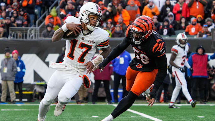 Bengals Joseph Ossai (58) chases down Browns Dorian Thompson-Robinson (17) during their game against the Browns at Paycor Stadium on Sunday December 22, 2024. The Bengals won the game with a final score of 24-6. Bengals Joseph Ossai (58) chases down Browns Dorian Thompson-Robinson (17) during their game against the Browns at Paycor Stadium on Sunday December 22, 2024. The Bengals won the game with a final score of 24-6.