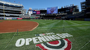 General view of Yankee Stadium as New York Yankees players warm up in the outfield before MLB Opening Day. 