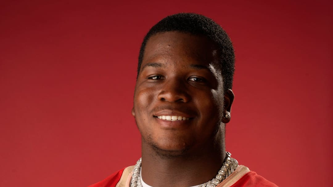 Cardinal Mooney Catholic High School defensive lineman Elijah Golden (#90). Cardinal Mooney Catholic High School defensive lineman Elijah Golden (#90).