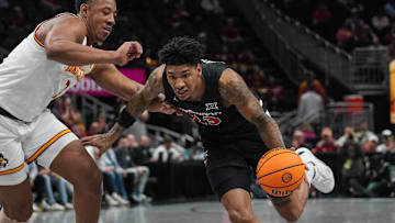 Bearcats Dillon Mitchell (23) takes the ball down the court during Game 2 of the 2025 Phillips 66 Big 12 Basketball Championship against the Iowa State Cyclones at the T-Mobile Center in Kansas City, Missouri on Wednesday March 12, 2025. Cyclones won the game with a final score of 76-56.