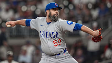 Sep 10, 2025; Cumberland, Georgia, USA; Chicago Cubs relief pitcher Andrew Kittredge (59) pitches against the Atlanta Braves during the ninth inning at Truist Park. Mandatory Credit: Dale Zanine-Imagn Images
