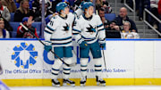 Mar 4, 2025; Buffalo, New York, USA;  San Jose Sharks center Will Smith (2) celebrates his goal with center Macklin Celebrini (71) during the third period against the Buffalo Sabres at KeyBank Center. Mandatory Credit: Timothy T. Ludwig-Imagn Images