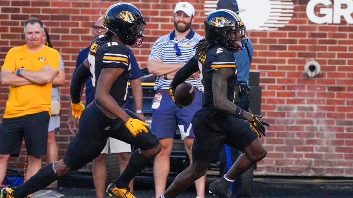 Aug 29, 2024; Columbia, Missouri, USA; Missouri Tigers cornerback Toriano Pride Jr. (2) scores after intercepting a pass against the Murray State Racers during the first half at Faurot Field at Memorial Stadium. Mandatory Credit: Denny Medley-USA TODAY Sports