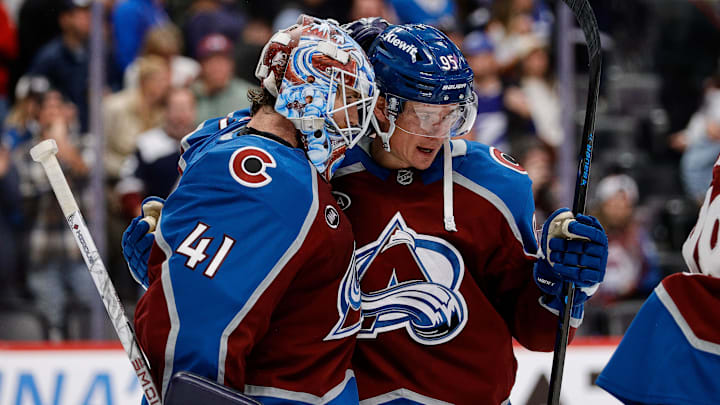 Nov 4, 2025; Denver, Colorado, USA; Colorado Avalanche goaltender Scott Wedgewood (41) and left wing Victor Olofsson (95) celebrate after the game against the Tampa Bay Lightning at Ball Arena. Mandatory Credit: Isaiah J. Downing-Imagn Images