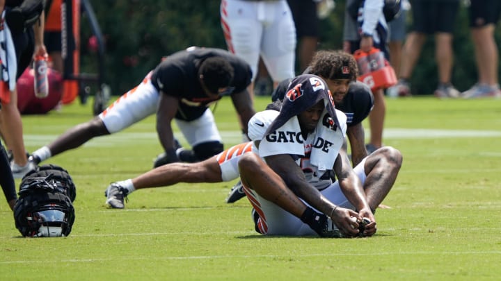 Bengals players and coaches run drills during their training camp on Monday August 5, 2024.