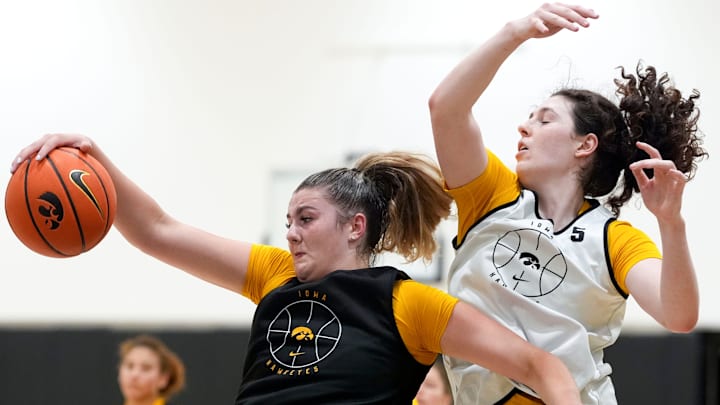 Iowa center Layla Hays grabs a rebound in front of Ava Heiden during a women’s basketball practice July 22, 2025 at Carver-Hawkeye Arena in Iowa City, Iowa.