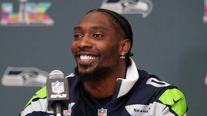 Seattle Seahawks defensive end DeMarcus Lawrence (0) talks to media members