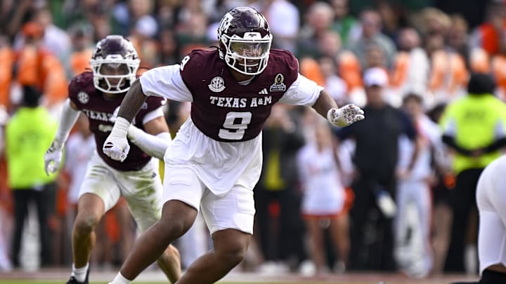 Dec 20, 2025; College Station, TX, USA; Texas A&M Aggies defensive end Cashius Howell (9) rushes the line during the game between the Aggies and the Hurricanes at Kyle Field. Mandatory Credit: Jerome Miron-Imagn Images