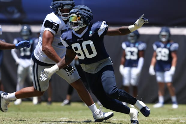 Dallas Cowboys defensive end DeMarcus Lawrence rushes during training camp in Oxnard, California. 