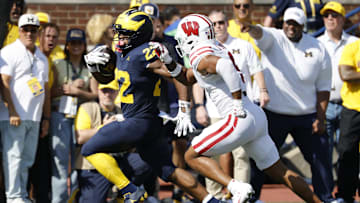 Oct 4, 2025; Ann Arbor, Michigan, USA;  Michigan Wolverines running back Justice Haynes (22) rushes in the first half against the Wisconsin Badgers at Michigan Stadium. Mandatory Credit: Rick Osentoski-Imagn Images