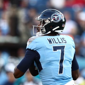 Aug 17, 2024; Nashville, Tennessee, USA; Tennessee Titans quarterback Malik Willis (7) drops back for a pass in the game against the Seattle Seahawks at Nissan Stadium. Mandatory Credit: Casey Gower-USA TODAY Sports