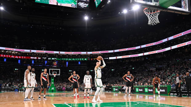 Apr 7, 2024; Boston, Massachusetts, USA; Boston Celtics center Kristaps Porzingis (8) shoots a free throw