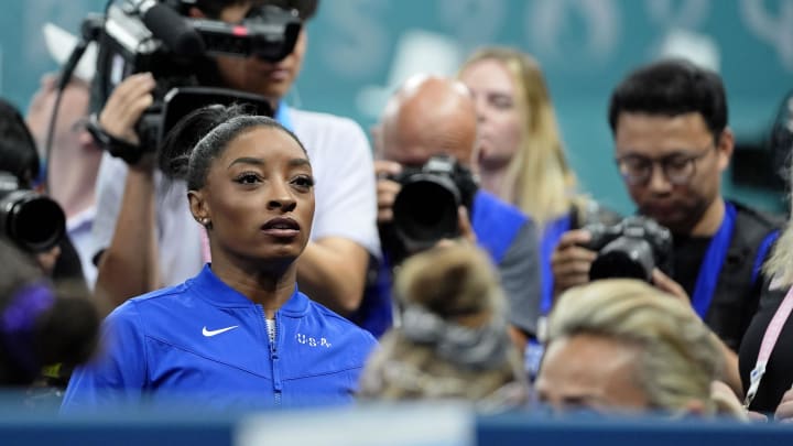 Aug 5, 2024; Paris, France; Simone Biles of the United States reacts after competing on the beam on day three of the gymnastics event finals during the Paris 2024 Olympic Summer Games. Mandatory Credit: Jack Gruber-USA TODAY Sports