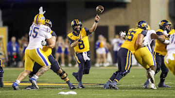 Sep 16, 2023; Morgantown, West Virginia, USA; West Virginia Mountaineers quarterback Nicco Marchiol (8) throws a pass during the first quarter against the Pittsburgh Panthers at Mountaineer Field at Milan Puskar Stadium. Mandatory Credit: Ben Queen-Imagn Images