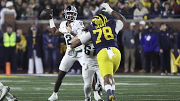 Oct 26, 2024; Ann Arbor, Michigan, USA;  Michigan State Spartans quarterback Aidan Chiles (2) passes in the first half against the Michigan Wolverines at Michigan Stadium. Mandatory Credit: Rick Osentoski-Imagn Images