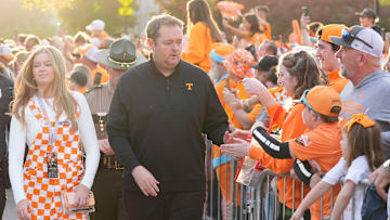 Tennessee head coach Josh Heupel greets fans on the Vol Walk ahead of the NCAA college football game between Tennessee and Mississippi State on Saturday, Nov. 9, 2024, in Knoxville, Tenn.