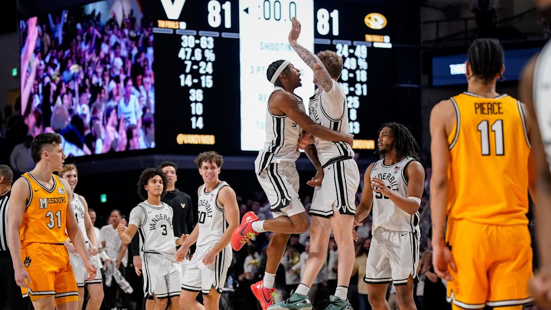 Vanderbilt guard Tyler Nickel (5) celebrates his three-point basket with guard MJ Collins Jr. (2) forcing the game against Missouri into overtime at Memorial Gym in Nashville, Tenn., Saturday, March 1, 2025.