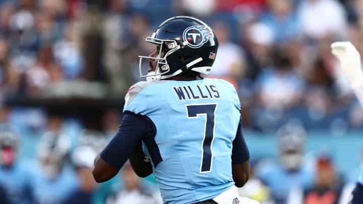 Aug 17, 2024; Nashville, Tennessee, USA; Tennessee Titans quarterback Malik Willis (7) drops back for a pass in the game against the Seattle Seahawks at Nissan Stadium. Mandatory Credit: Casey Gower-USA TODAY Sports