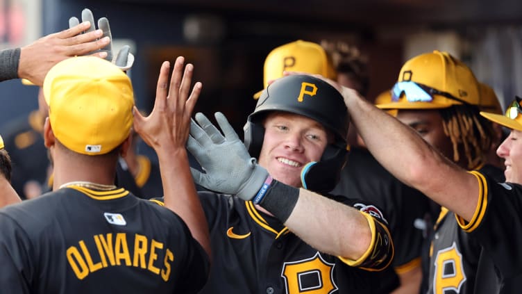 Mar 15, 2024; Tampa, Florida, USA; Pittsburgh Pirates infielder Jack Brannigan (83) celebrates with teammates in the dugout after hitting a home run during the third inning against the New York Yankees at George M. Steinbrenner Field. Mandatory Credit: Kim Klement Neitzel-USA TODAY Sports