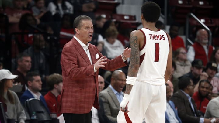 Feb 7, 2026; Starkville, Mississippi, USA; Arkansas Razorbacks head coach John Calipari tlaks with guard Meleek Thomas (1) during the second half against the Mississippi State Bulldogs at Humphrey Coliseum. Mandatory Credit: Petre Thomas-Imagn Images