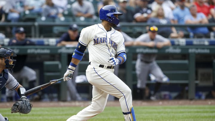 Seattle Mariners second baseman Robinson Cano (22) hits an RBI-fielders choice against the New York Yankees during the eighth inning at Safeco Field in 2018.