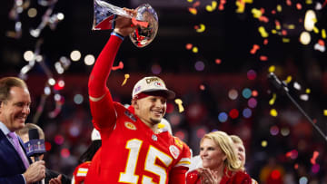 Feb 11, 2024; Paradise, Nevada, USA; Kansas City Chiefs quarterback Patrick Mahomes (15) celebrates with the Vince Lombardi Trophy after defeating the San Francisco 49ers in overtime of Super Bowl LVIII at Allegiant Stadium. Mandatory Credit: Mark J. Rebilas-USA TODAY Sports