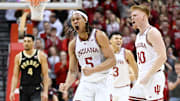 Indiana Hoosiers forward Malik Reneau (5) and Indiana Hoosiers forward Luke Goode (10) celebrate after a play during the second half against the Purdue Boilermakers at Simon Skjodt Assembly Hall.