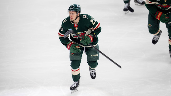 Apr 24, 2025; Saint Paul, Minnesota, USA; Minnesota Wild center Marco Rossi (23) leads the team to the bench after scoring against the Vegas Golden Knights in the first period in game three of the first round of the 2025 Stanley Cup Playoffs at Xcel Energy Center. Mandatory Credit: Matt Blewett-Imagn Images