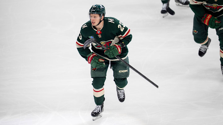 Apr 24, 2025; Saint Paul, Minnesota, USA; Minnesota Wild center Marco Rossi (23) leads the team to the bench after scoring against the Vegas Golden Knights in the first period in game three of the first round of the 2025 Stanley Cup Playoffs at Xcel Energy Center. Mandatory Credit: Matt Blewett-Imagn Images