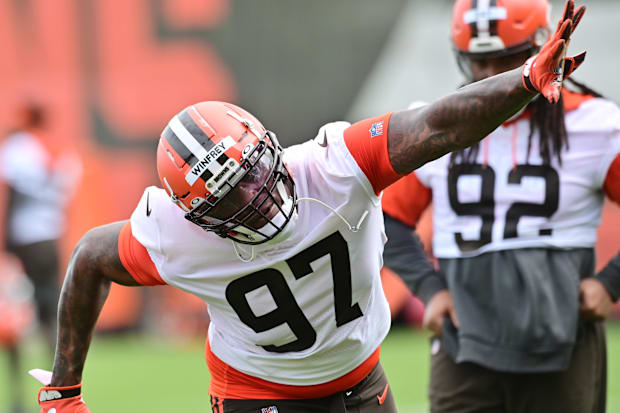 Browns defensive tackle Perrion Winfrey runs a drill during organized team activities at CrossCountry Mortgage Campus.