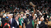 Jun 17, 2024; Boston, Massachusetts, USA; Boston Celtics guard Jaylen Brown (7) holds the MVP trophy after winning the 2024 NBA Finals against the Dallas Mavericks at TD Garden. Mandatory Credit: Peter Casey-USA TODAY Sports