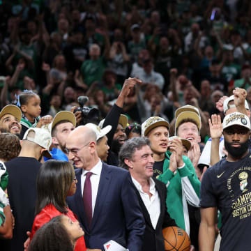 Jun 17, 2024; Boston, Massachusetts, USA; Boston Celtics guard Jaylen Brown (7) holds the MVP trophy after winning the 2024 NBA Finals against the Dallas Mavericks at TD Garden. Mandatory Credit: Peter Casey-USA TODAY Sports