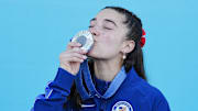 Aug 10, 2024; Le Bourget, France; Silver medalist Brooke Raboutou (USA) celebrates at the medal ceremony in the women's boulder and lead competition during the Paris 2024 Olympic Summer Games at Le Bourget Sport Climbing Venue. Mandatory Credit: Andrew P. Scott-Imagn Images