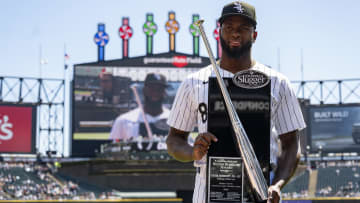 Apr 13, 2024; Chicago, Illinois, USA; Chicago White Sox Luis Robert Jr. (88) is presented the Silver Slugger Award prior to a game against the Cincinnati Reds at Guaranteed Rate Field. Mandatory Credit: Patrick Gorski-USA TODAY Sports
