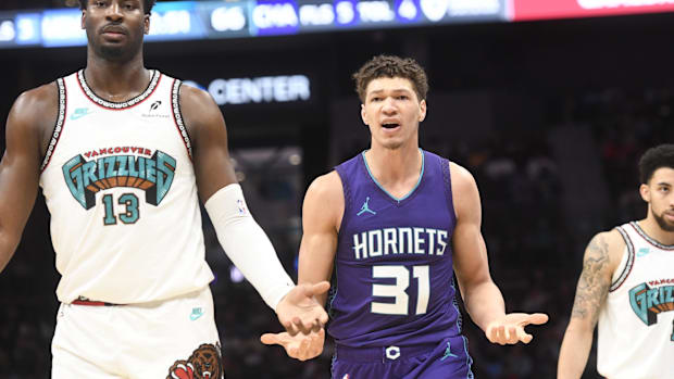 Charlotte Hornets forward Tidjane Salaun (31) complains after he is called on a foul against Memphis Grizzlies forward cente