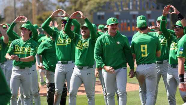May 31, 2024; Santa Barbara, CA, USA;  Oregon Ducks players celebrate victory after defeating San Diego 5-4 in extra innings of an NCAA Baseball Santa Barbara Regional game at Caesar Uyesaka Stadium. Mandatory Credit: Kiyoshi Mio-USA TODAY Sports