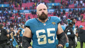 Oct 20, 2024; London, United Kingdom; Jacksonville Jaguars center Mitch Morse (65) leaves the field after the game against the New England Patriots  during an NFL International Series game at Wembley Stadium. Mandatory Credit: Peter van den Berg-Imagn Images